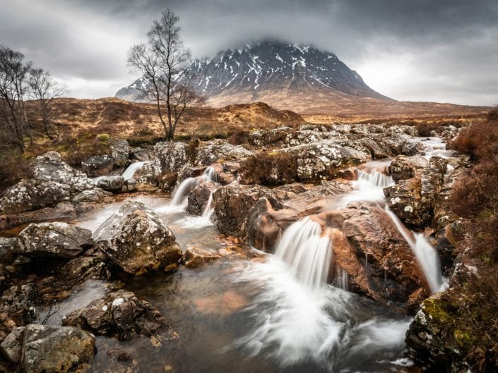 Scotland etive moor, glencoe area Coupall Falls of River Coupall with mountain Buachaille Etive Mor in background. Buachaille Etive Mor, Coupall Falls, River Coupall, Glen Coe, Highlands, Scotland, UK.