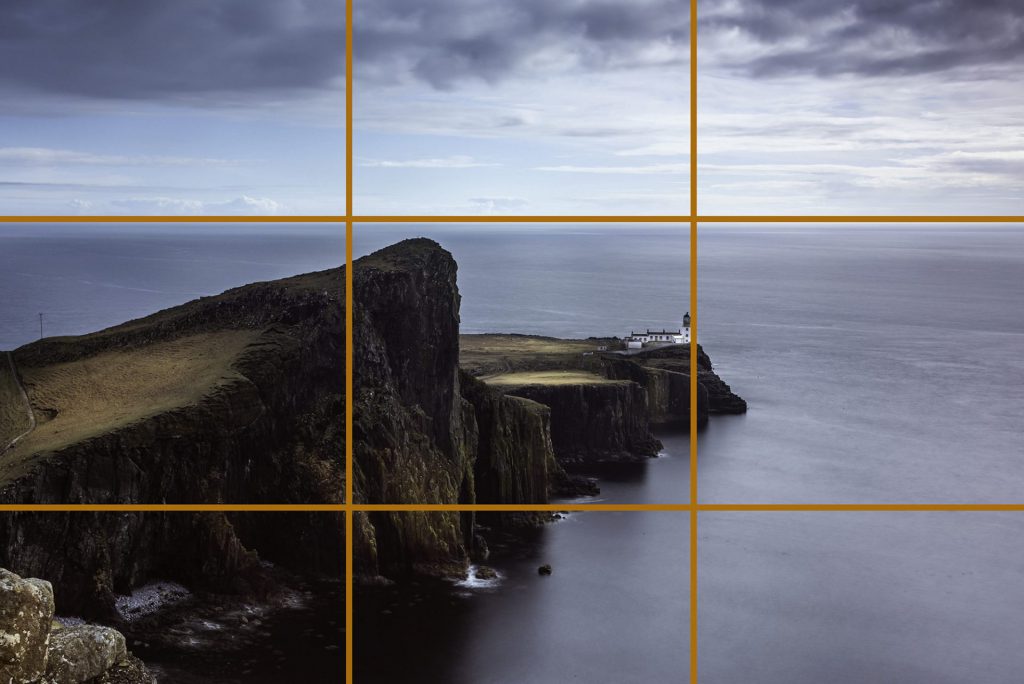 landscape photo of the famous Neist Point lighthouse in Scotland on the most westerly tip of the Isle of Skye near the township of Glendale illustrating the rule of thirds