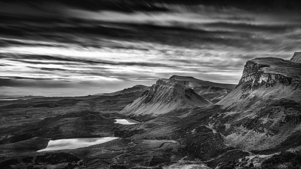 Black and white landscape photo with dramatic sky on the Isle of skye