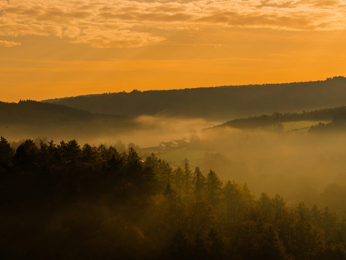 landscape photo with morning mist around Bouillon, Belgium