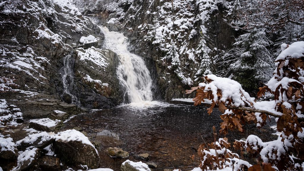 winter landscape photo of waterfall on Bayehon river, East Belgium with snow