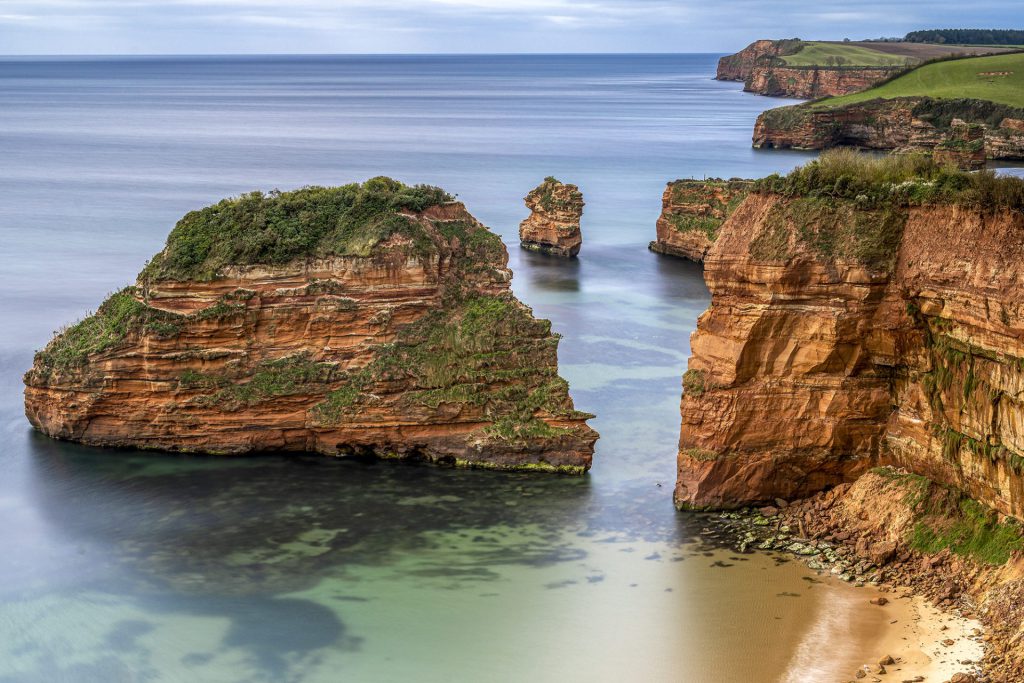 Seascape photo of sea stack in Cornwall seen form the cliffs