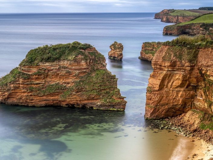 Seascape photo of sea stack in Cornwall seen form the cliffs