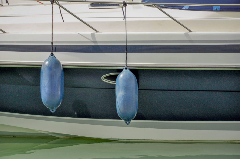 seascape photo focused on the side of a sailing boat