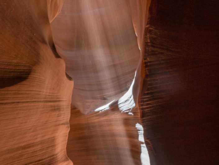 landscape photo of light beams in the Antelope Canyon