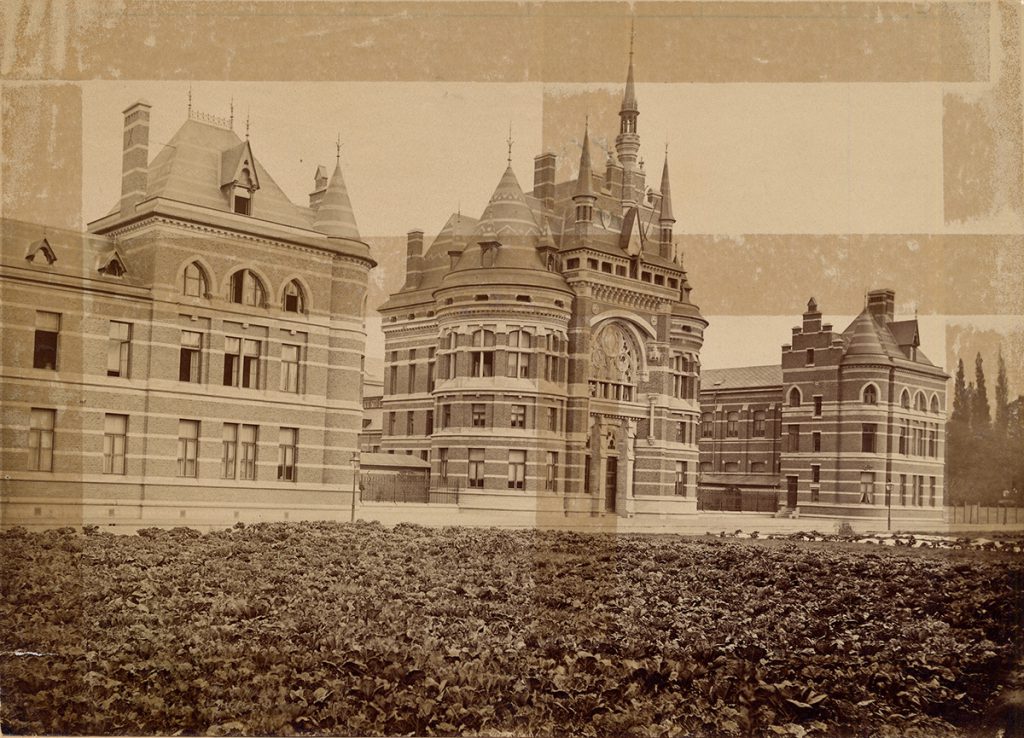 damaged photo of old building before restoration