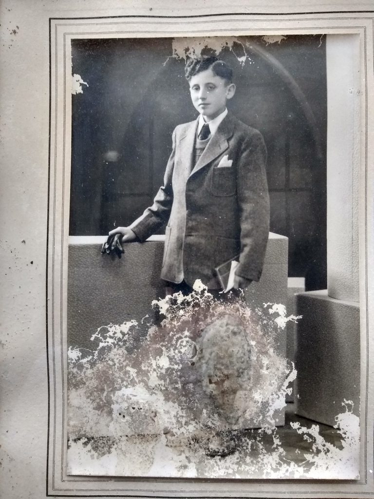 old damaged family photo before restoration