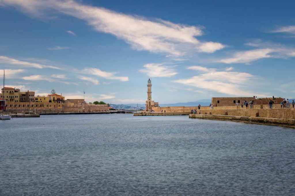 The picture shows Chania's Venetian harbour, with the iconic lighthouse at the centre of the picture. On the left are historic buildings; on the right, a long stone pier draws the eye towards the city centre. The mood is timeless, with soft light and a calm sea. The style is documentary with a fine art finish. The picture exudes tranquillity, history and a sense of continuity. The lighthouse represents direction and protection; the still water invites introspection. The image connects past and present and shows the quiet power of places that defy time.
Travel Photography trip to Crete